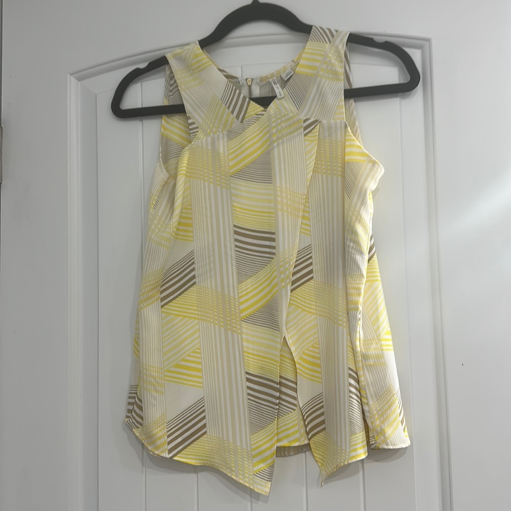 Yellow tripped tank top with zipper on the the back
